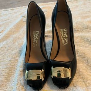 New Salvatore Ferragamo peep toe pumps.